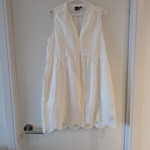 White Sleeveless Dress with Eyelet Hem